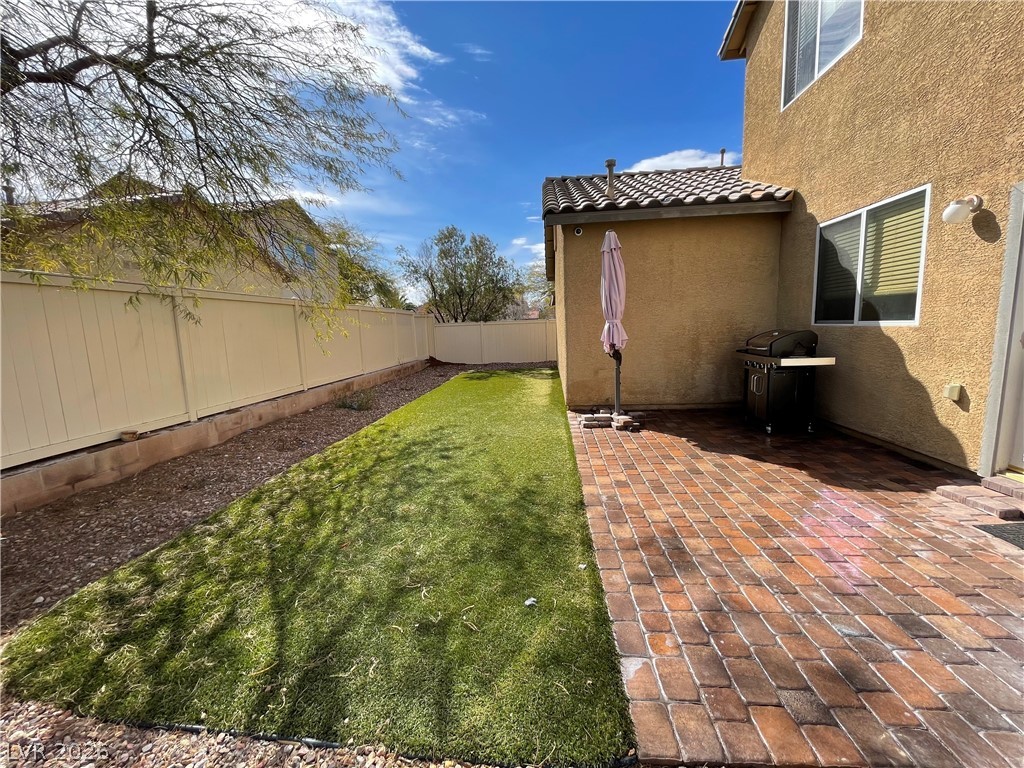 1019 Garnet Ridge Court Las Vegas, NV 89123 - Photo 26 of 34 Fenced backyard featuring a patio