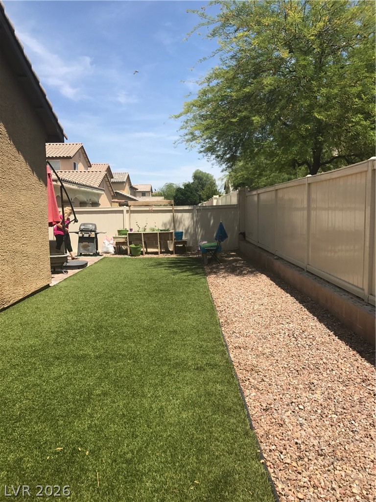 1019 Garnet Ridge Court Las Vegas, NV 89123 - Photo 27 of 34 Fenced backyard featuring a patio