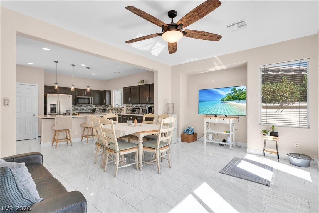 1019 Garnet Ridge Court Las Vegas, NV 89123 - Photo 9 of 34 Dining space with ceiling fan and recessed lighting
