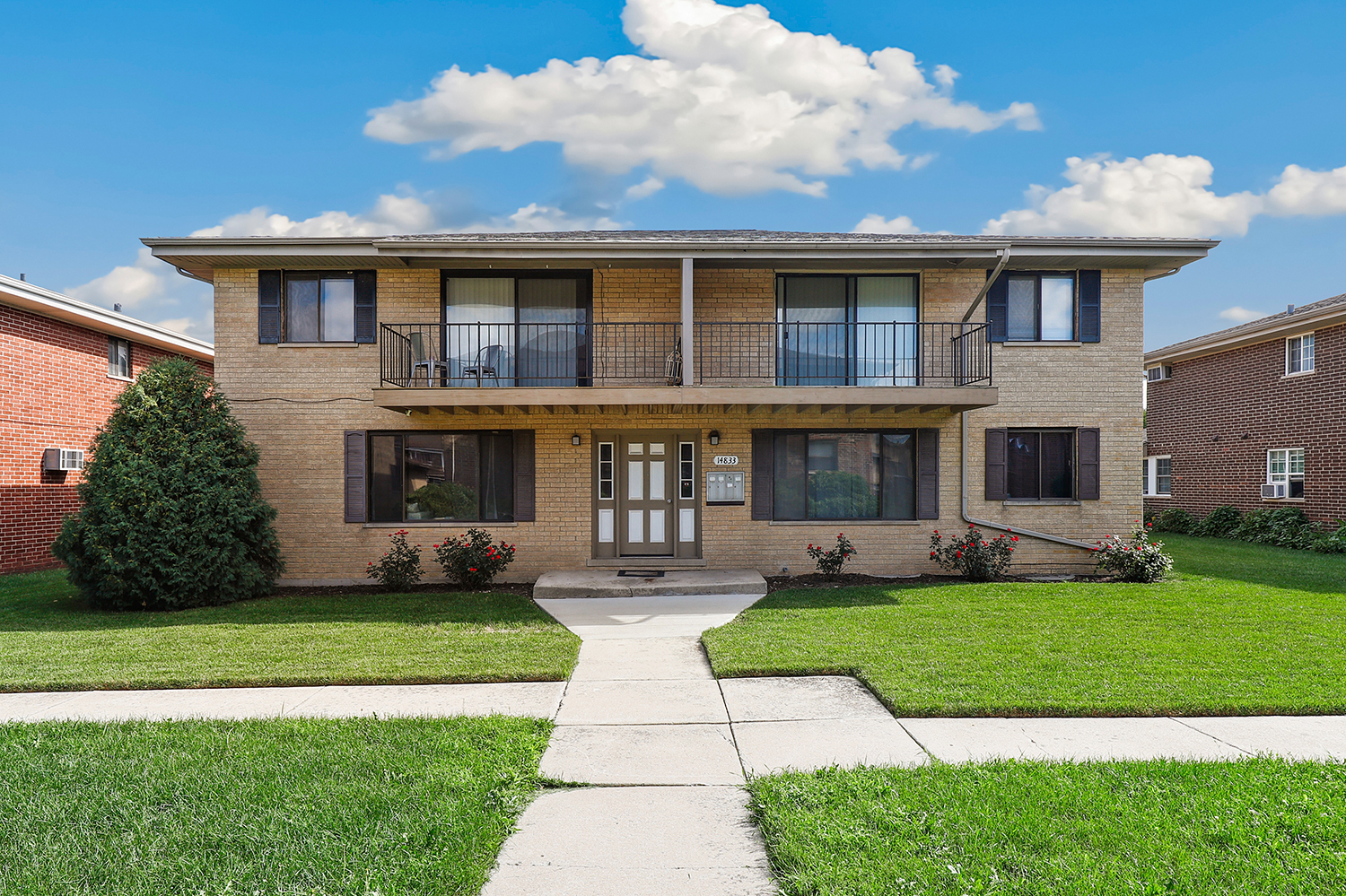 14833 Kilpatrick Avenue Midlothian, IL 60445 - Photo 1 of 1 a front view of a house with a yard