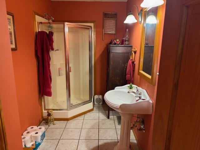 165 Pittman Road Somerville, TN 38068 - Photo 6 of 17 Bathroom featuring a shower stall and tile patterned floors