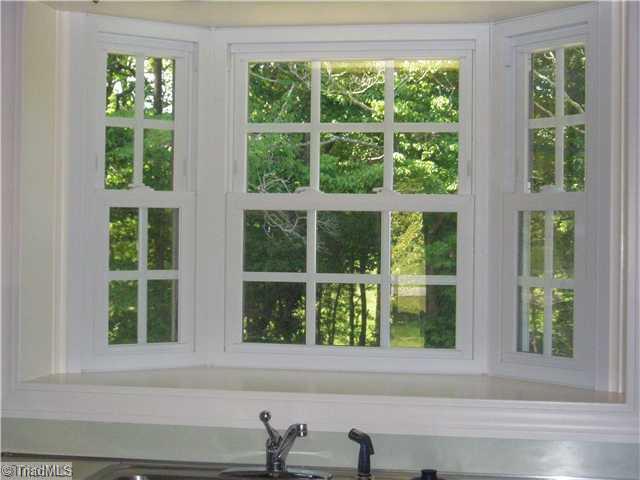 225 Mocks Church Road Advance, NC 27006 - Photo 6 of 12 Kitchen. Garden window in kitchen