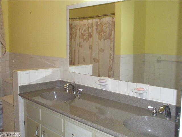 225 Mocks Church Road Advance, NC 27006 - Photo 9 of 12 Other. Solid surface counters in bath