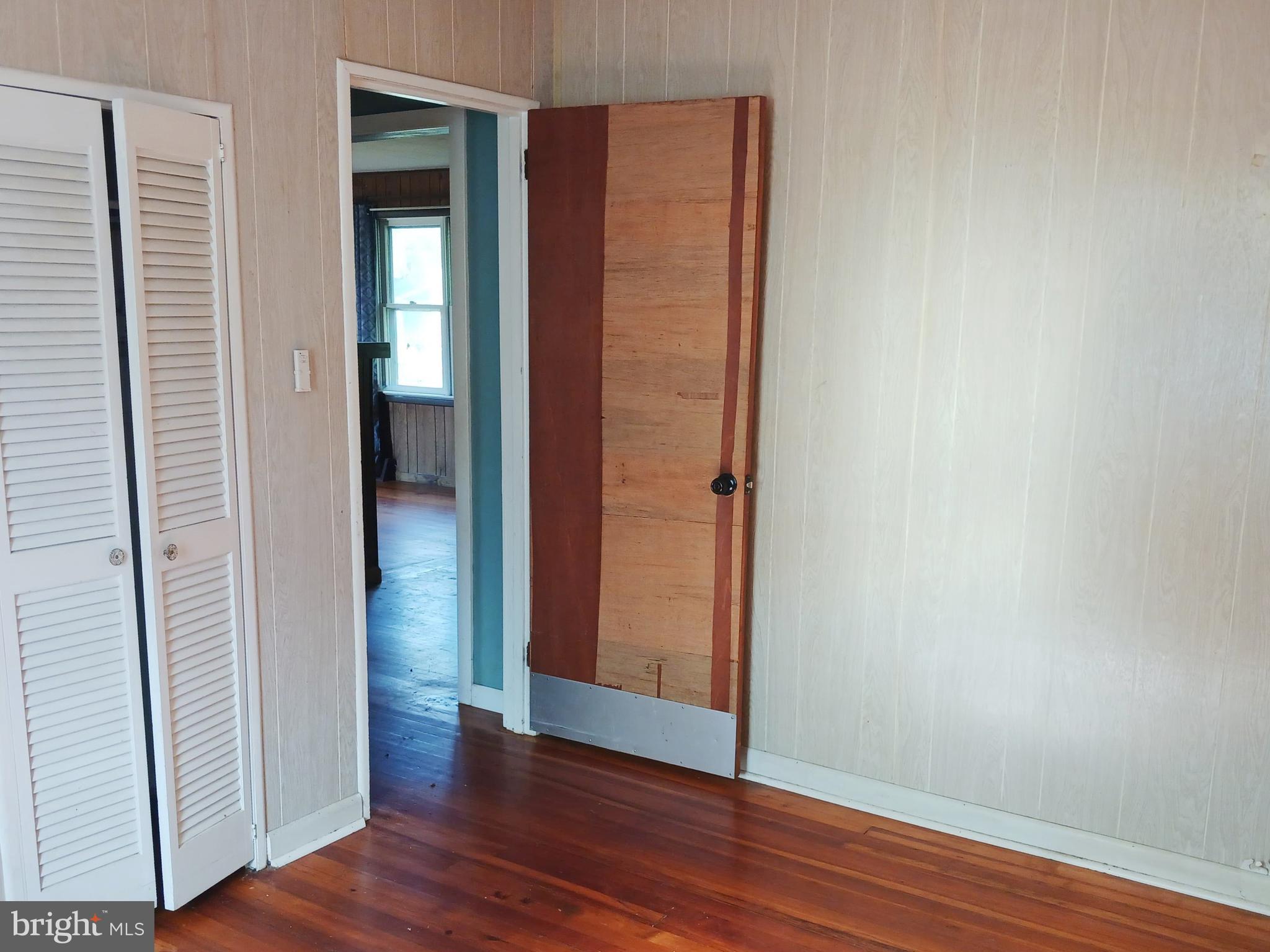 3100 Highway 9 Rio Grande, NJ 08242 - Photo 8 of 16 an empty room with wooden floor and closet