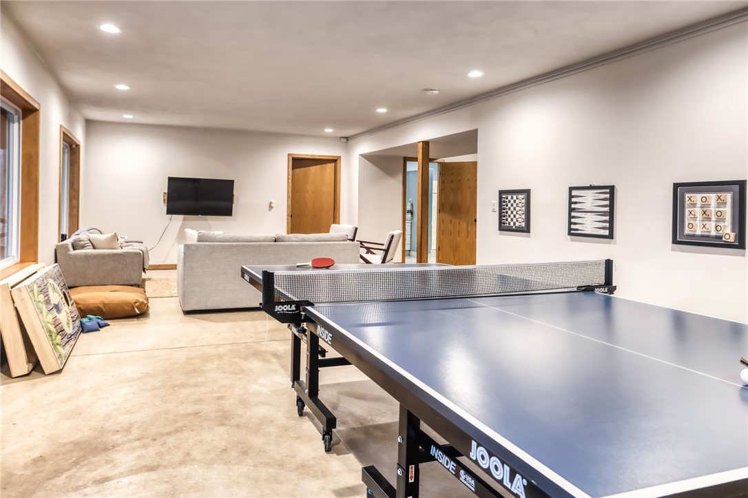 735 Howell Road Conquest, NY 13140 - Photo 47 of 49 This level is open and bright and makes a wonderfu