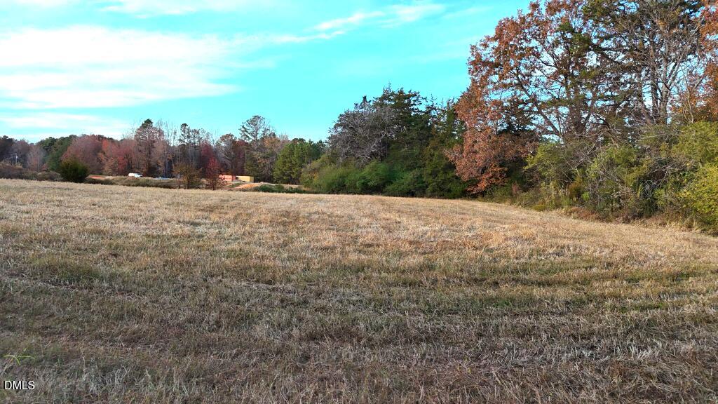 Lot 1 Cheeks Quarter Road Henderson, NC 27537 - Photo 18 of 19 a view of an outdoor space and covered with trees