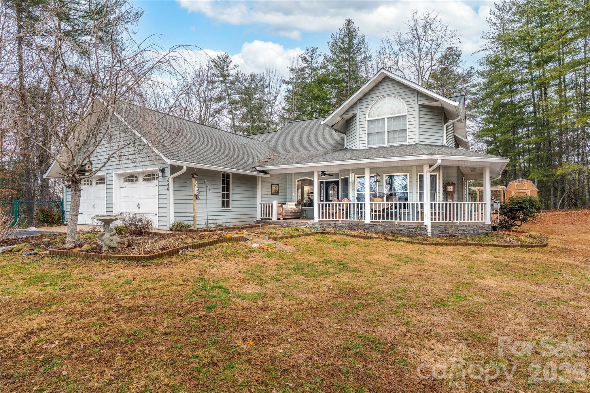 649 Upper Bailey Branch Road Mars Hill, NC 28754 - Photo 1 of 37 a view of a yard in front of house