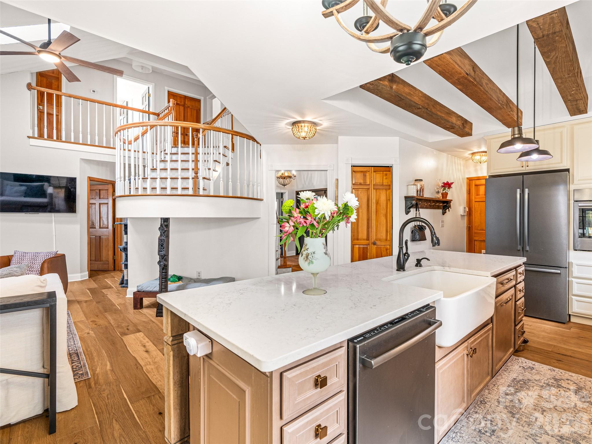 649 Upper Bailey Branch Road Mars Hill, NC 28754 - Photo 15 of 37 a kitchen that has a table and chairs in it