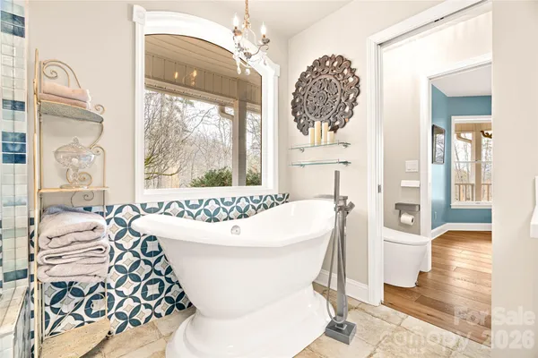 a bedroom with a bed and cabinets