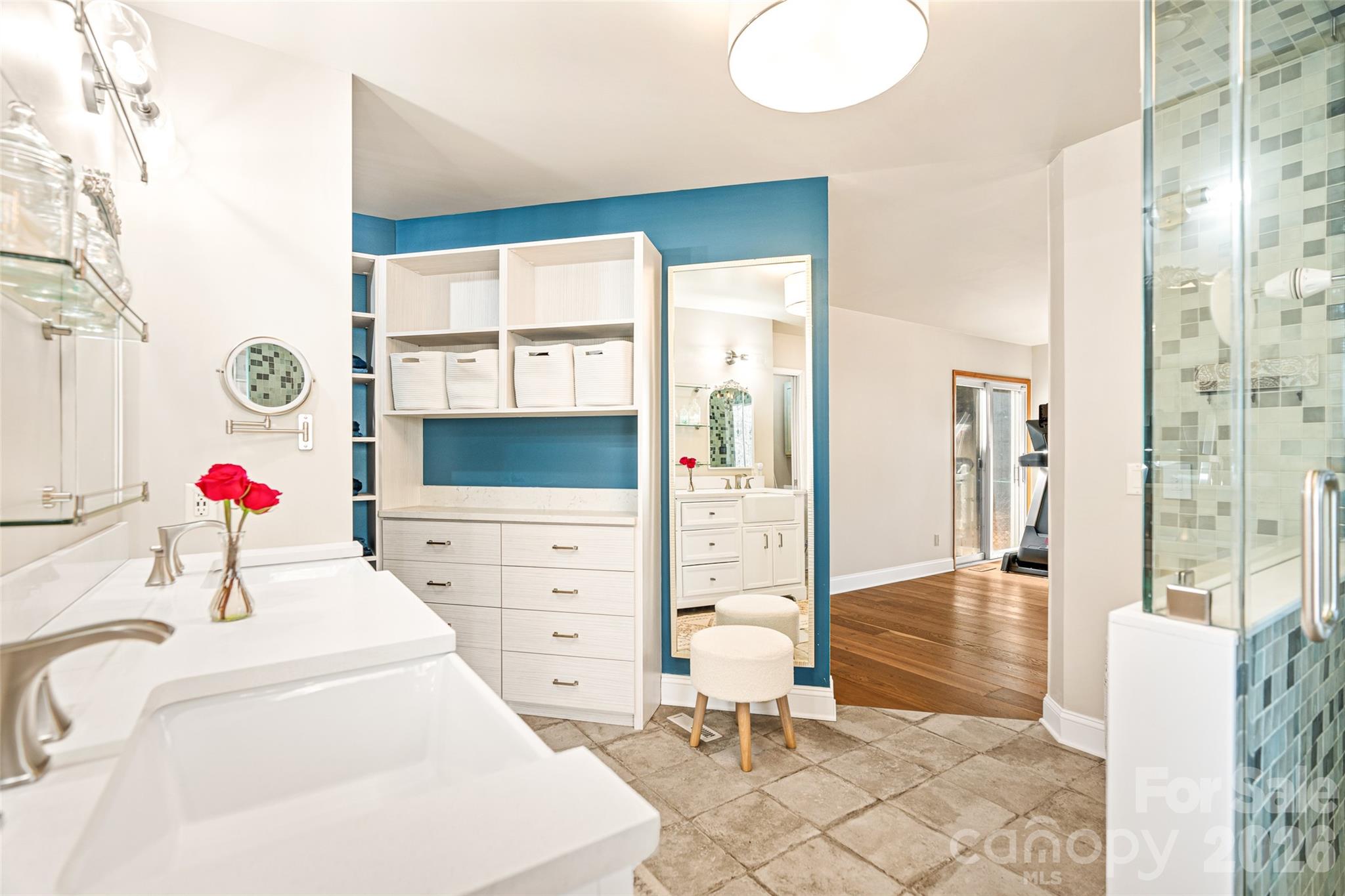 649 Upper Bailey Branch Road Mars Hill, NC 28754 - Photo 21 of 37 a bedroom with a bed and cabinets