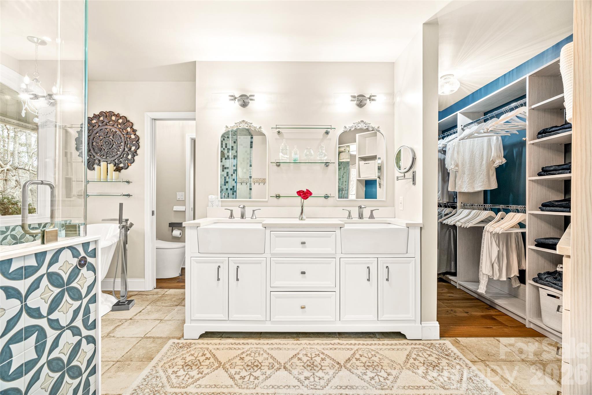 649 Upper Bailey Branch Road Mars Hill, NC 28754 - Photo 22 of 37 a spacious bathroom with a double vanity sink a mirror and a bathtub