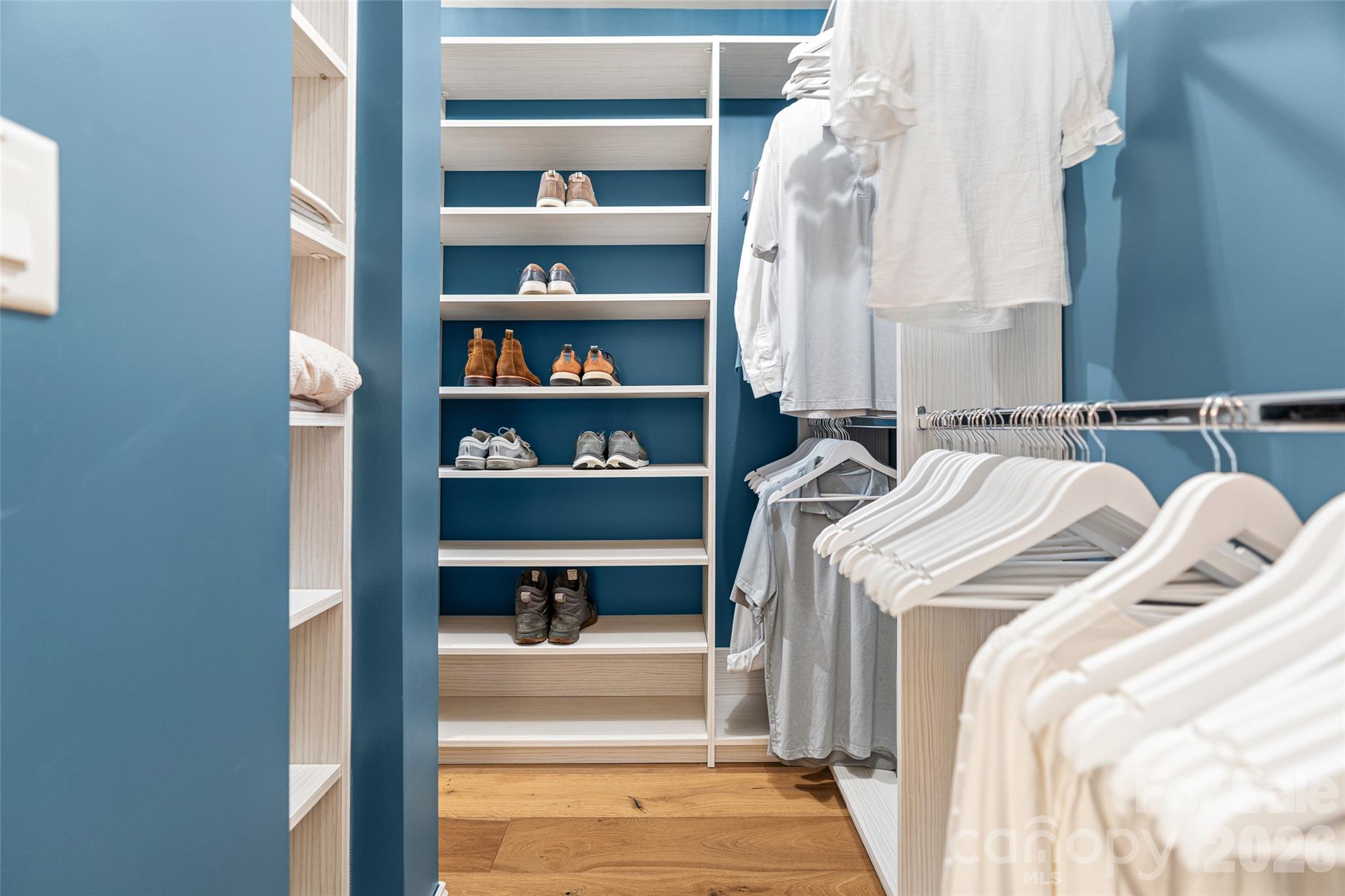 649 Upper Bailey Branch Road Mars Hill, NC 28754 - Photo 23 of 37 a view of walk in closet with clothes and shoes