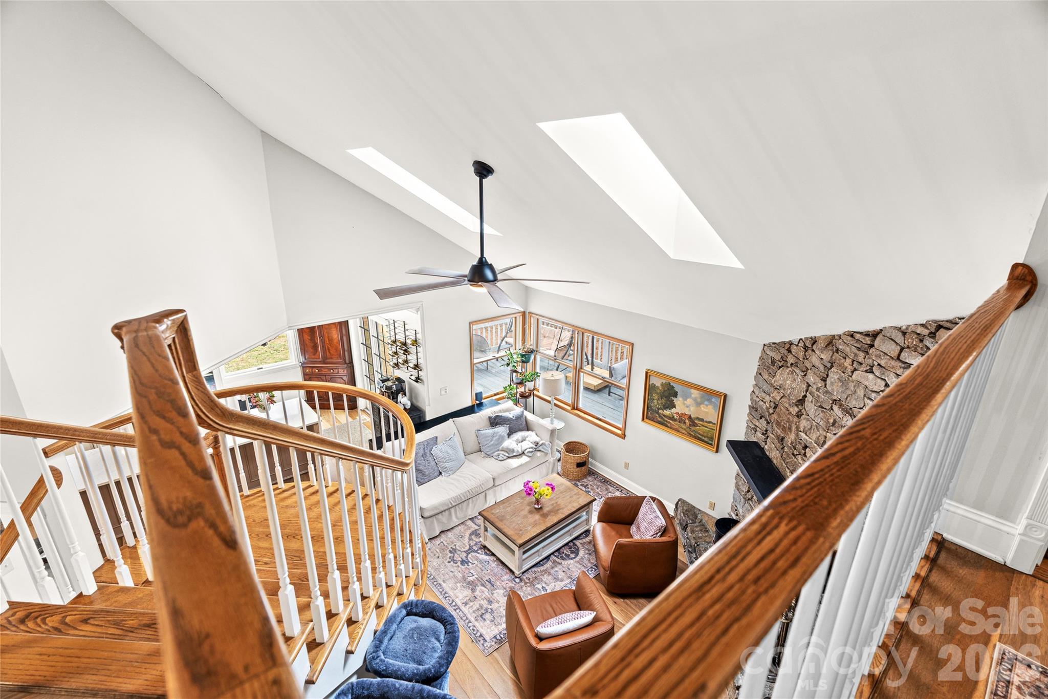 649 Upper Bailey Branch Road Mars Hill, NC 28754 - Photo 27 of 37 a view of a livingroom with furniture and entryway