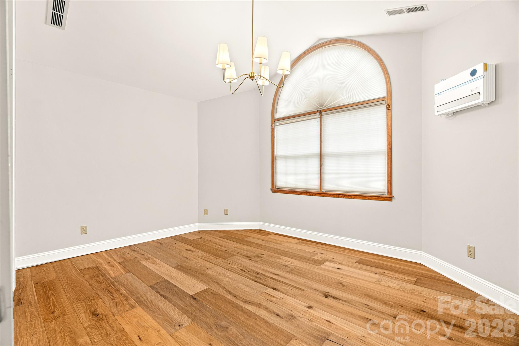 649 Upper Bailey Branch Road Mars Hill, NC 28754 - Photo 31 of 37 an empty room with windows