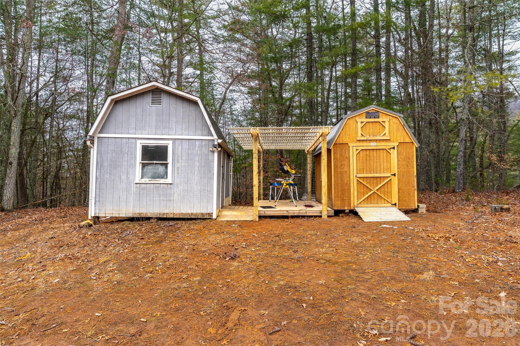 649 Upper Bailey Branch Road Mars Hill, NC 28754 - Photo 32 of 37 a view of a house with a yard
