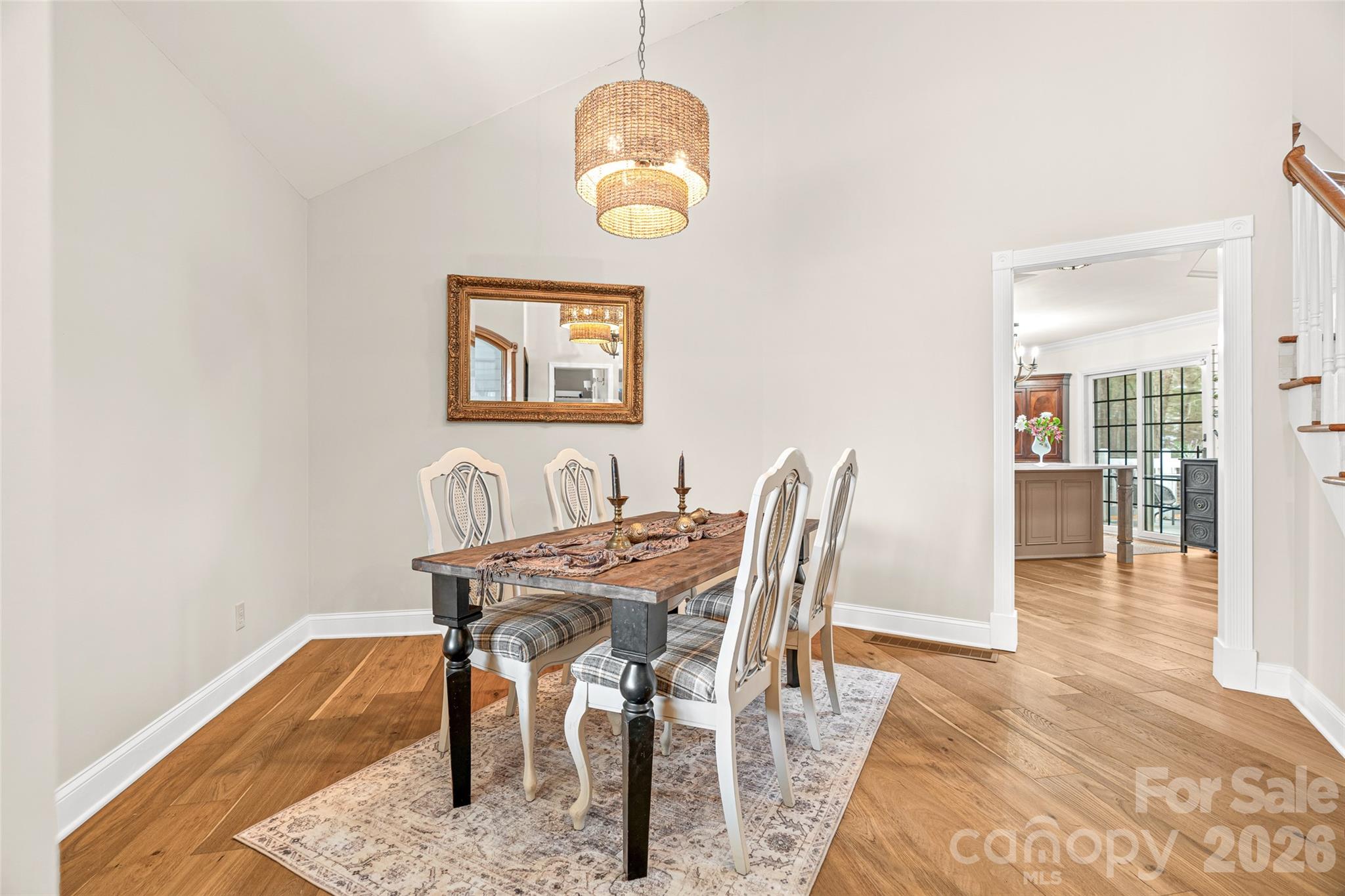 649 Upper Bailey Branch Road Mars Hill, NC 28754 - Photo 10 of 37 a view of a dining room with furniture and wooden floor