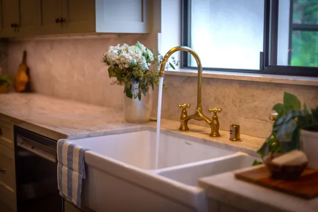a bathroom with a bathtub and shower