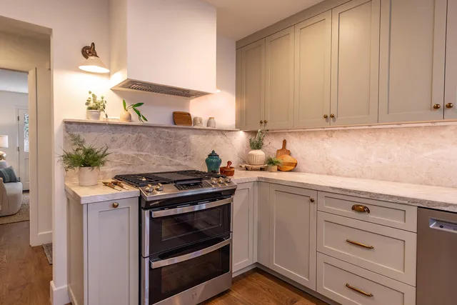 a living room with furniture rug and window