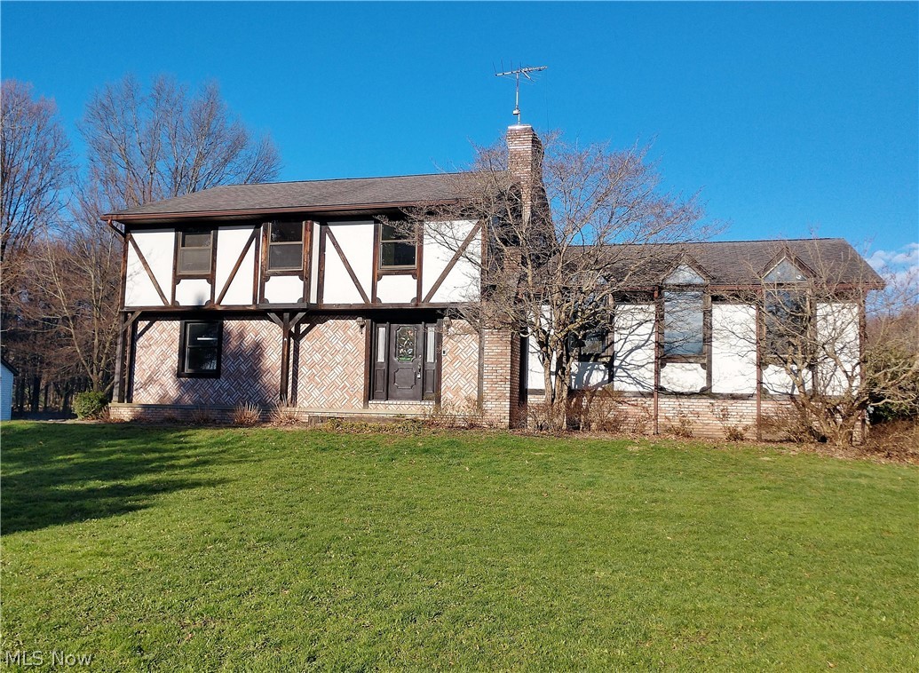 915 Sandy Lake Road Kent, OH 44240 - Photo 1 of 35 Welcome to 915 Sandy Lake Rd., Kent mailing address, but Brimfield twp. This lovely 4 BR, 2.5 bath home situated on just shy of 8 acres is full of happy surprises!
