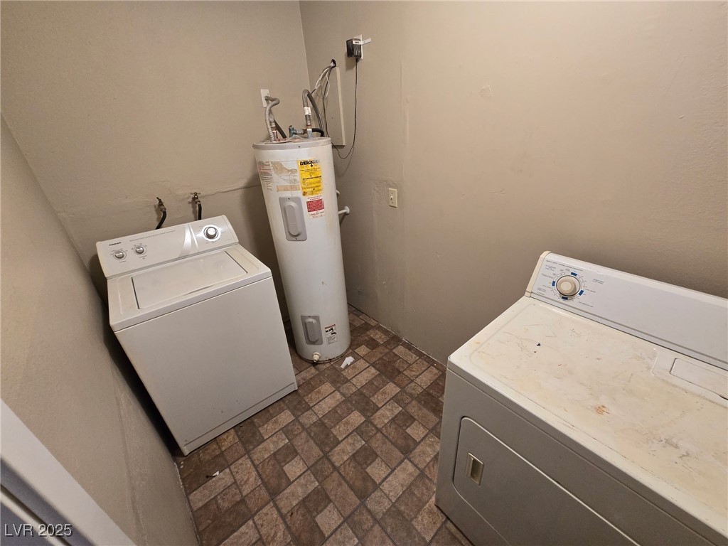 2213 North Jones Boulevard, Unit 2 Las Vegas, NV 89108 - Photo 3 of 3 Laundry area with washer and dryer, electric water