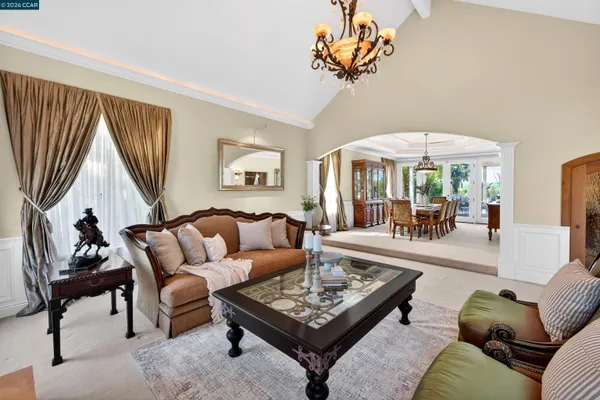 a kitchen with stainless steel appliances granite countertop a stove and a refrigerator