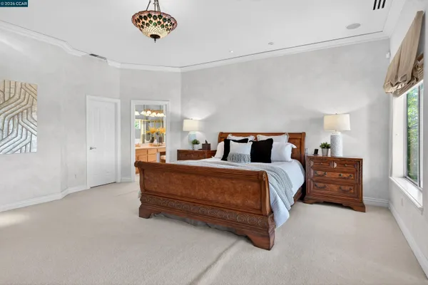 a view of a swimming pool and lounge chair
