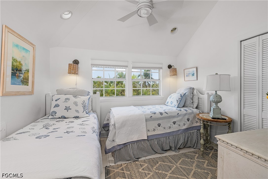 515 Useppa Useppa Island Bokeelia, FL 33922 - Photo 35 of 43 a bedroom with a bed and a window