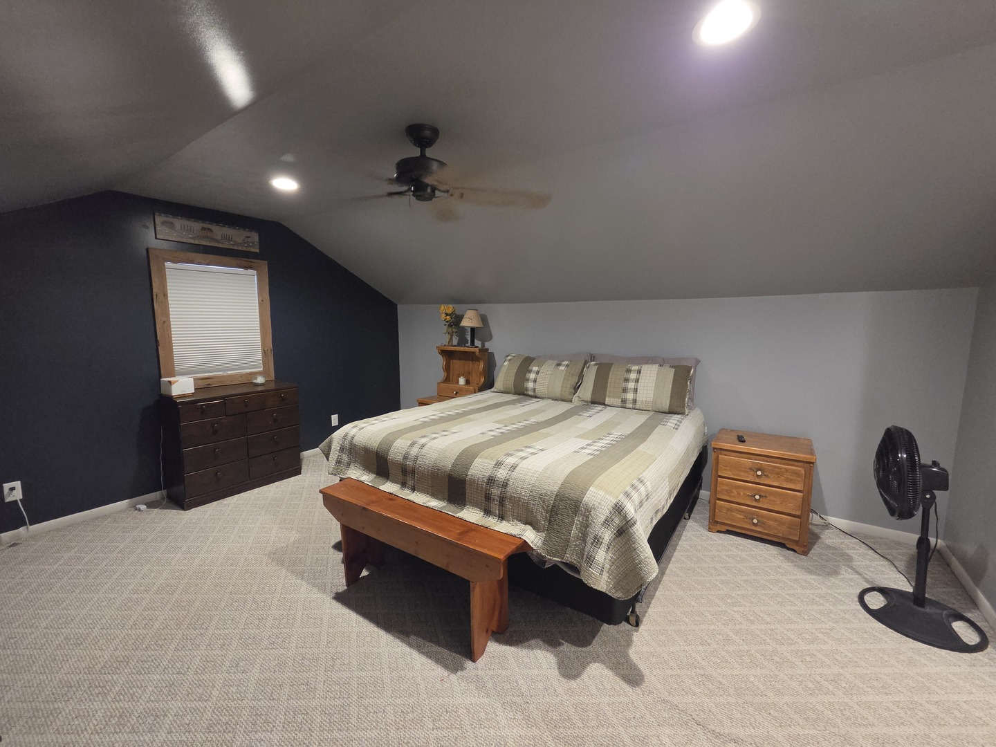 1000 West McKinley Road Ottawa, IL 61350 - Photo 11 of 19 a bedroom with a bed and a chandelier