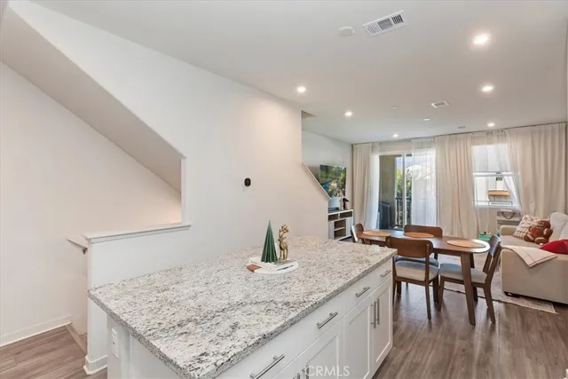 a kitchen with a table and chairs in it