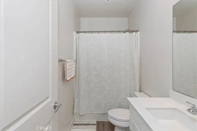 a bathroom with a sink and toilet