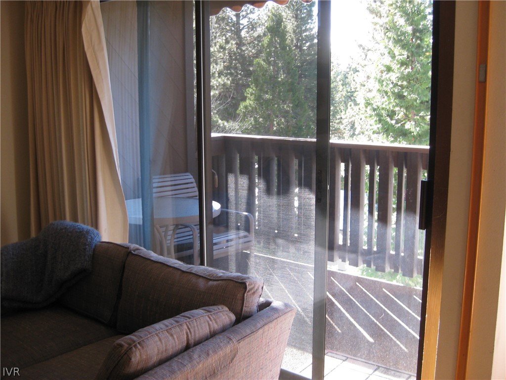 335 Ski Way, Unit 314 Incline Village, NV 89451 - Photo 14 of 15 a living room with furniture and a floor to ceiling window