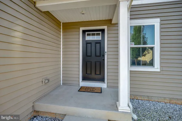 a view of a door and a window