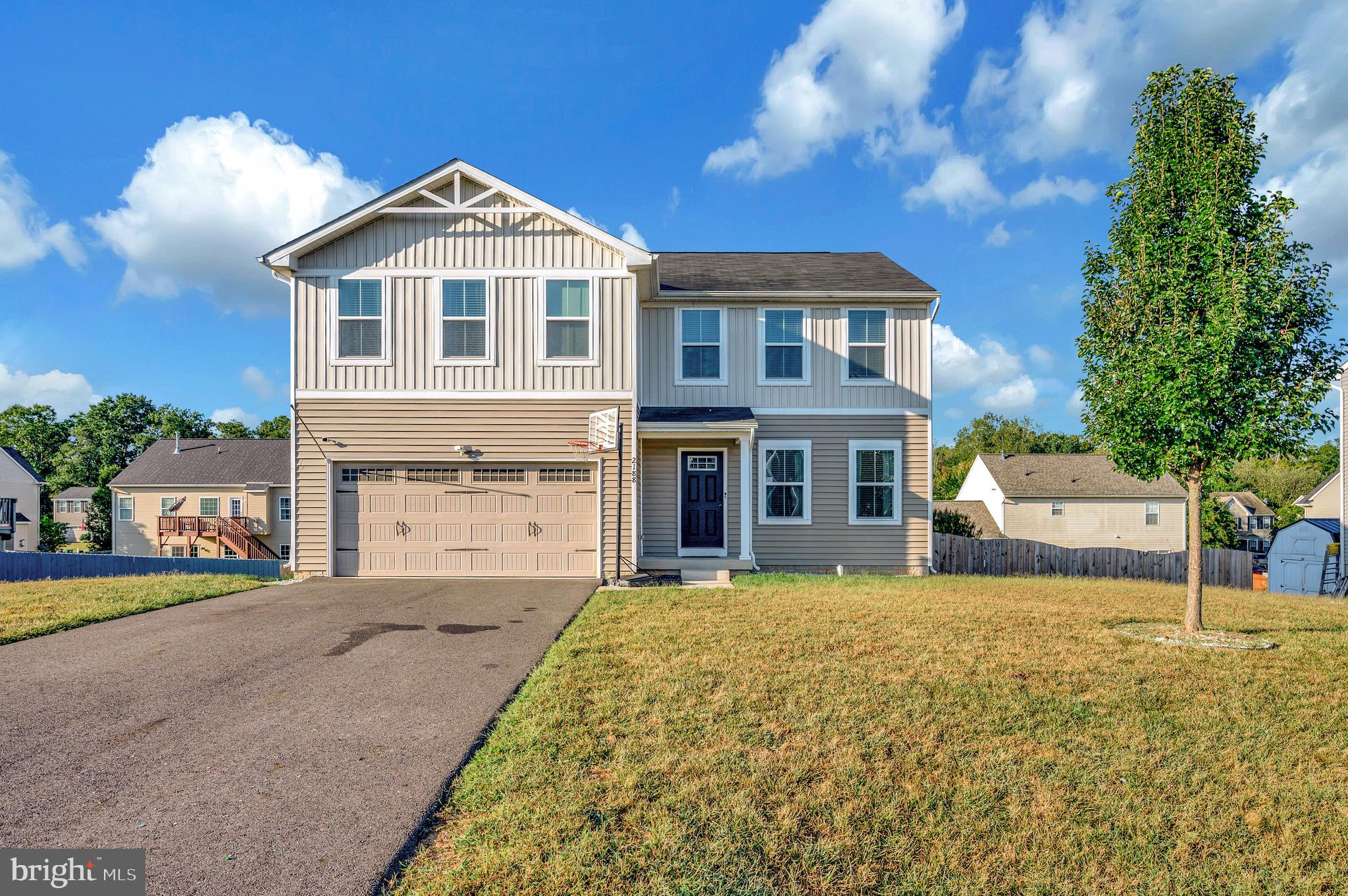 2188 Mallard Lane Locust Grove, VA 22508 - Photo 2 of 45 a front view of a house with a yard