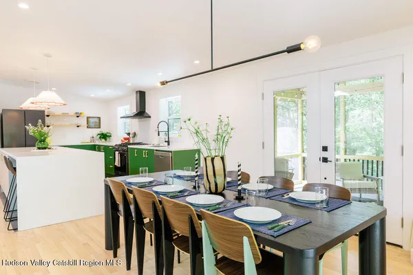 a view of a dining room and livingroom
