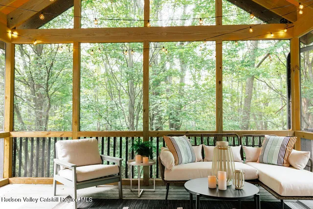 a living room with furniture and a window