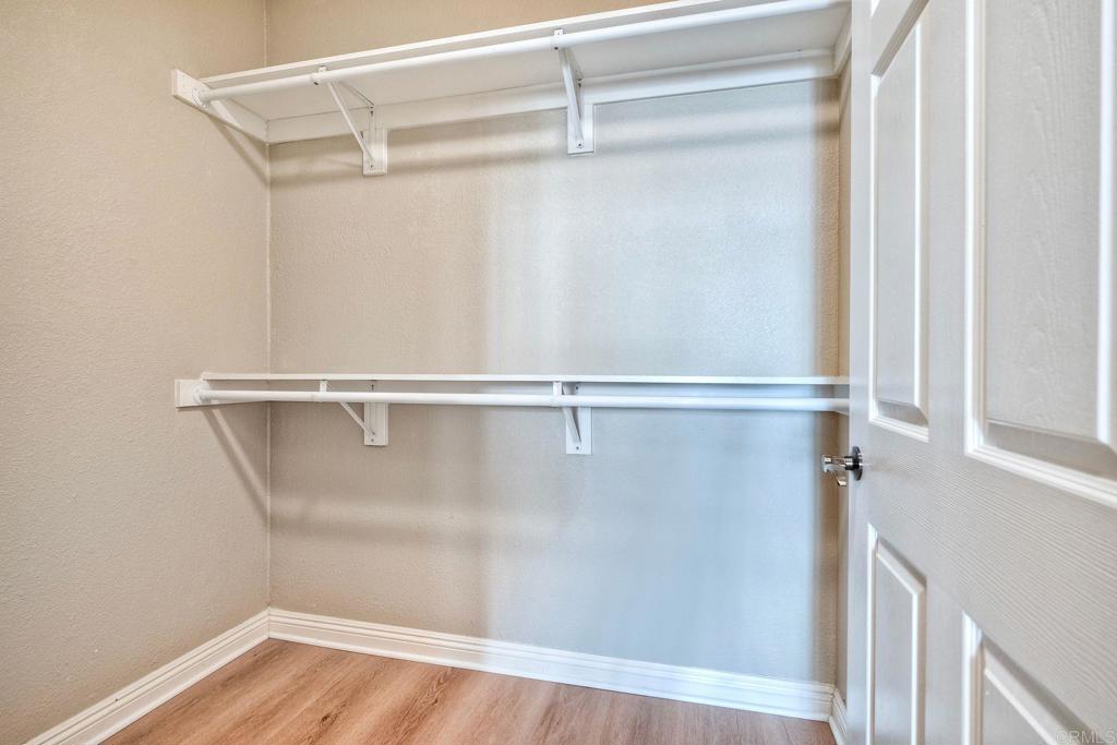 9263 Regents Road La Jolla, CA 92037 - Photo 26 of 37 a view of a room with wooden floor