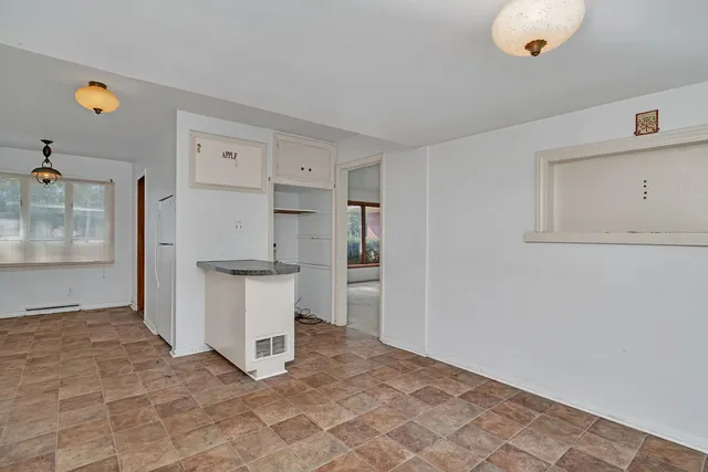 a view of an entryway with a window