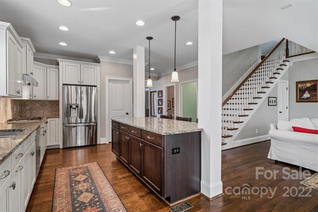 771 Harvest Pointe Drive Fort Mill, SC 29708 - Photo 15 of 48 a kitchen with stainless steel appliances granite countertop a refrigerator a oven and a stove