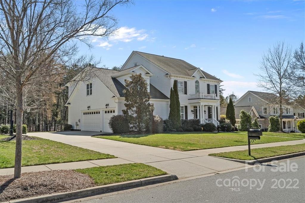 771 Harvest Pointe Drive Fort Mill, SC 29708 - Photo 2 of 48 a front view of house with yard and green space