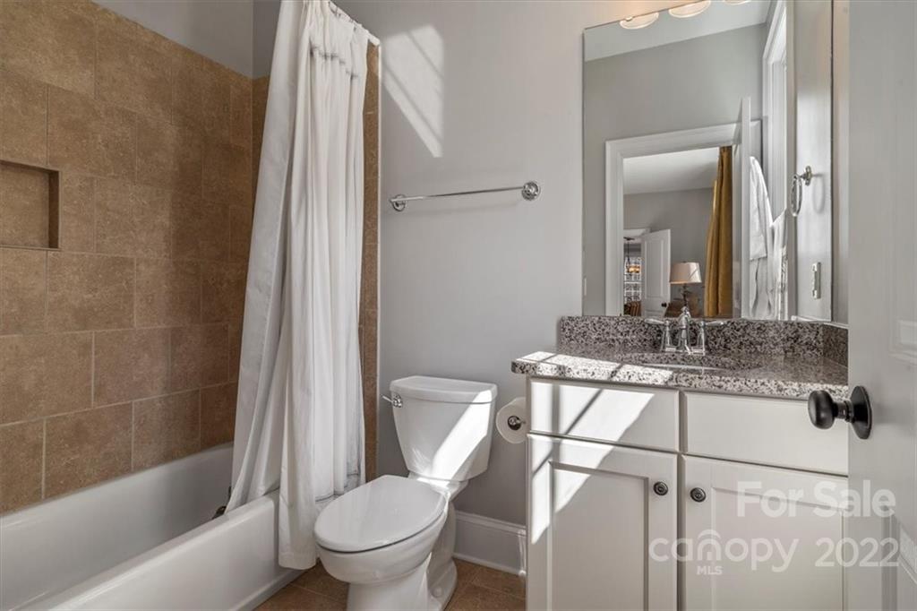 771 Harvest Pointe Drive Fort Mill, SC 29708 - Photo 23 of 48 a bathroom with a sink toilet and shower