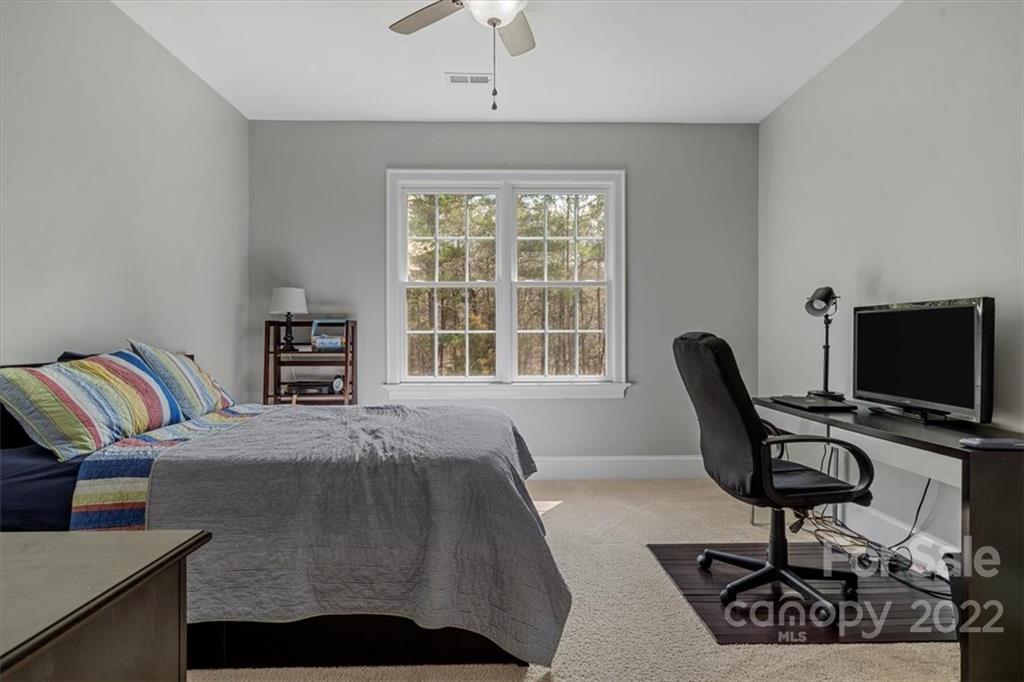 771 Harvest Pointe Drive Fort Mill, SC 29708 - Photo 29 of 48 a view of a livingroom with workspace and a couch