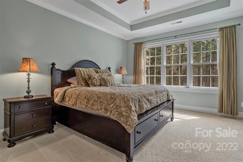 771 Harvest Pointe Drive Fort Mill, SC 29708 - Photo 31 of 48 a bedroom with a bed and a window