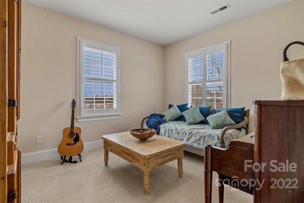 771 Harvest Pointe Drive Fort Mill, SC 29708 - Photo 36 of 48 a living room with furniture a window and a lamp