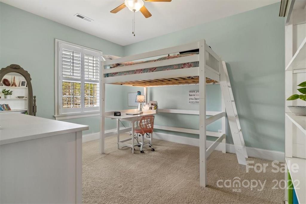 771 Harvest Pointe Drive Fort Mill, SC 29708 - Photo 37 of 48 a view of a livingroom with furniture and a window