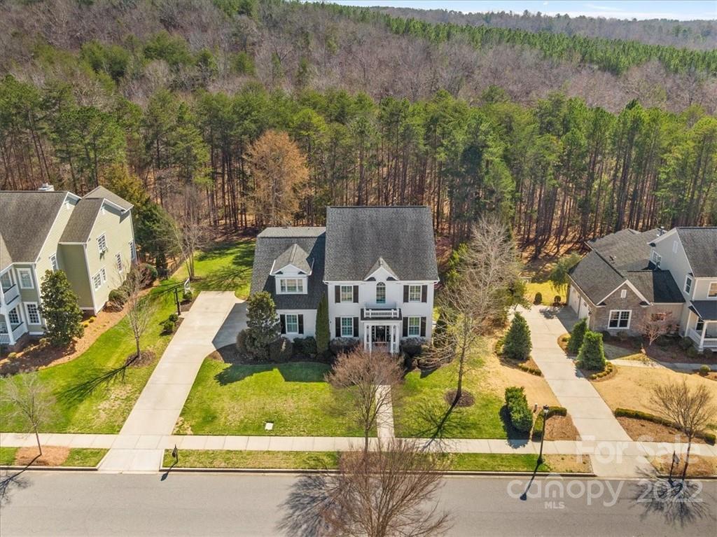 771 Harvest Pointe Drive Fort Mill, SC 29708 - Photo 38 of 48 an aerial view of residential houses with outdoor space and parking