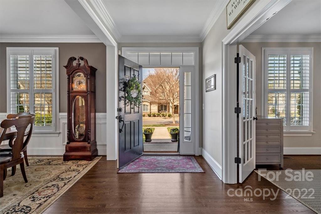 771 Harvest Pointe Drive Fort Mill, SC 29708 - Photo 4 of 48 a view of a hallway with wooden floor and windows
