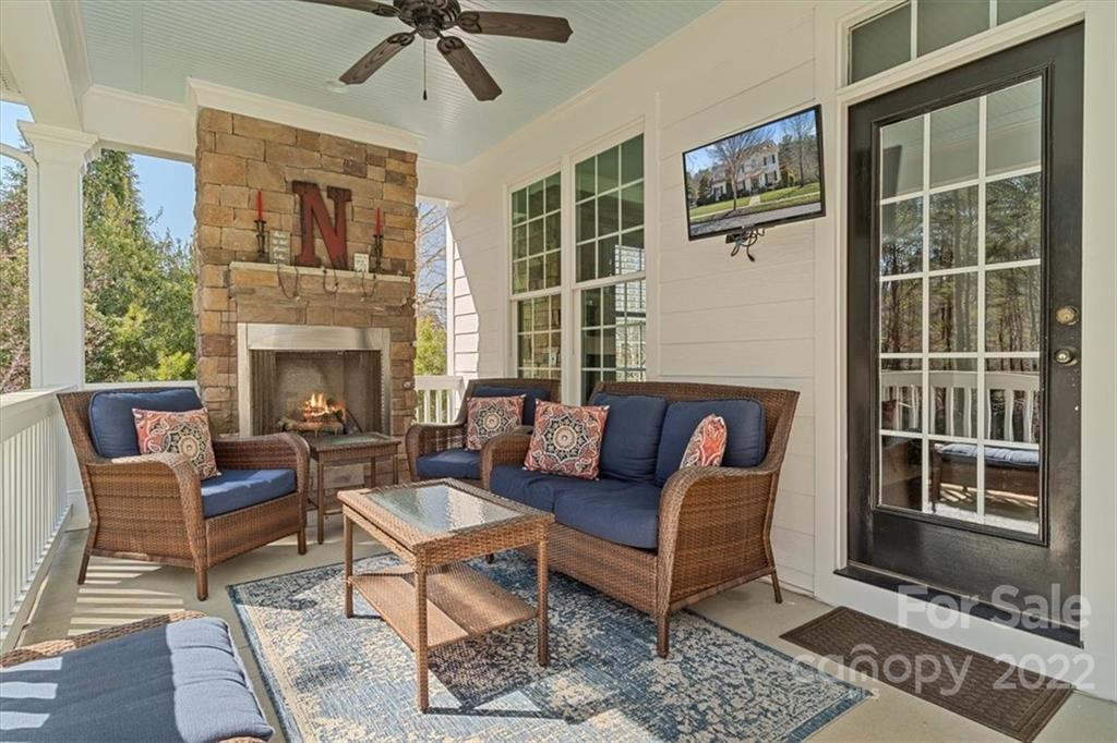 771 Harvest Pointe Drive Fort Mill, SC 29708 - Photo 44 of 48 a living room with furniture and a fireplace