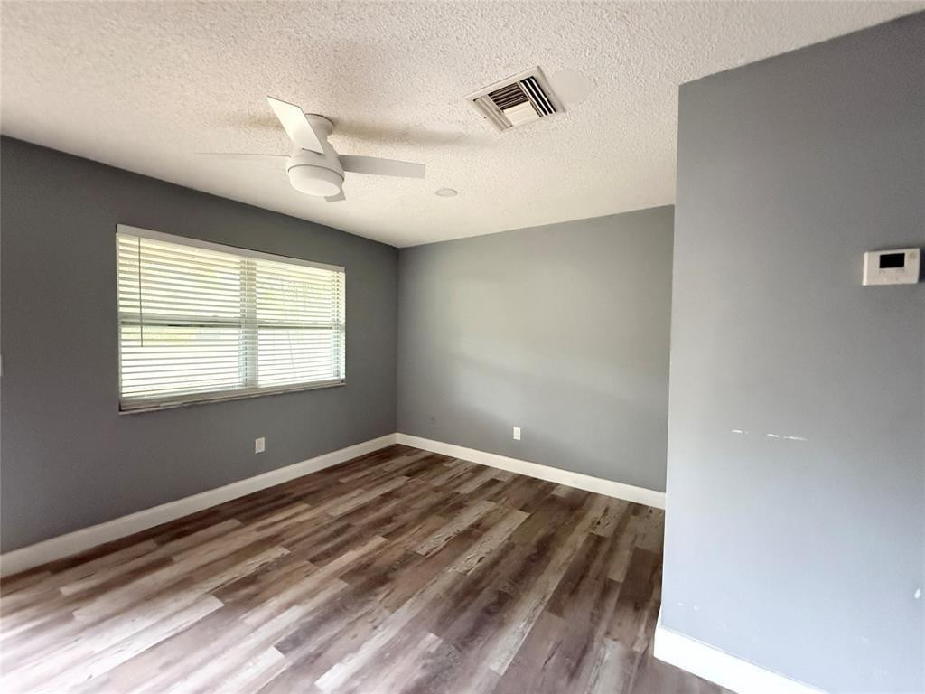 800 Southeast 18th Street, Unit 2 Fort Lauderdale, FL 33316 - Photo 2 of 5 a view of room with window and ceiling fan