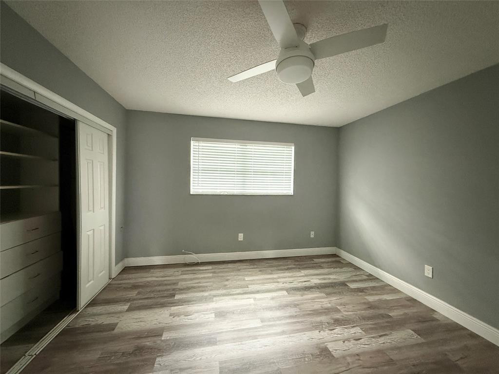 800 Southeast 18th Street, Unit 2 Fort Lauderdale, FL 33316 - Photo 4 of 5 a view of room with window and ceiling fan