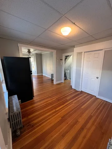 a view of a livingroom with wooden floor